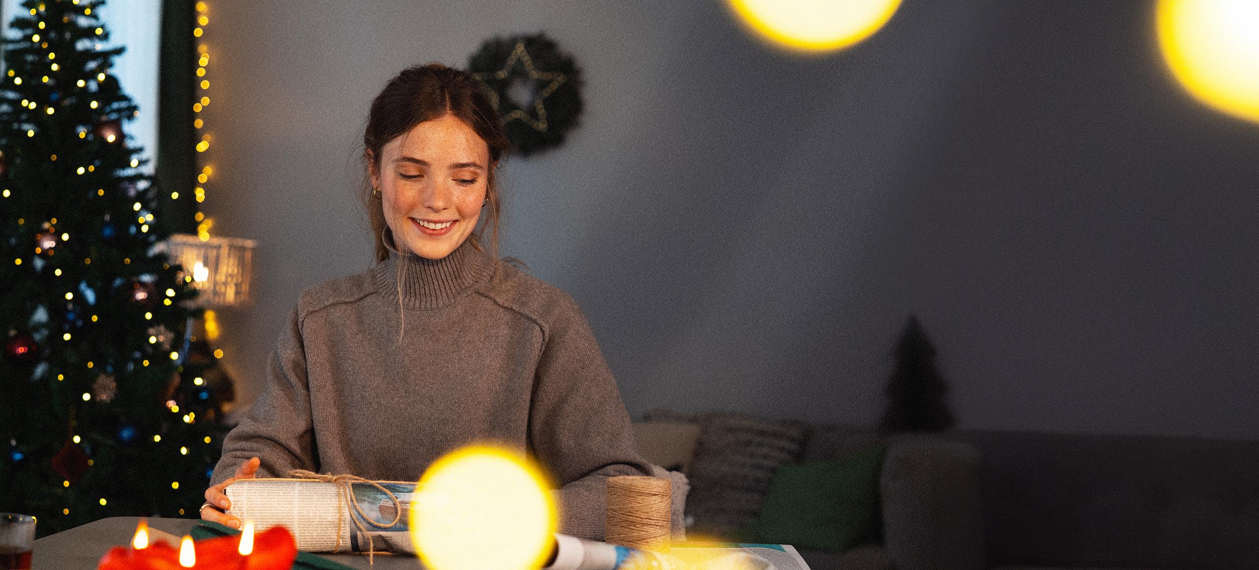 Women wrapping Christmas presents