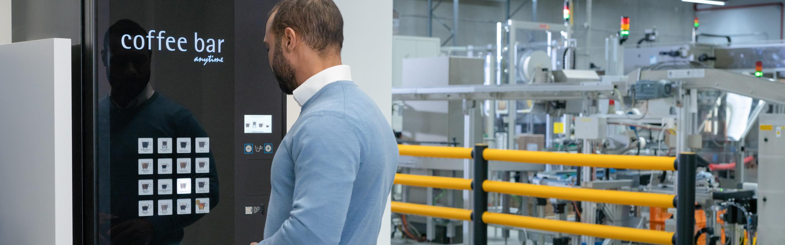 A man at a vending machine